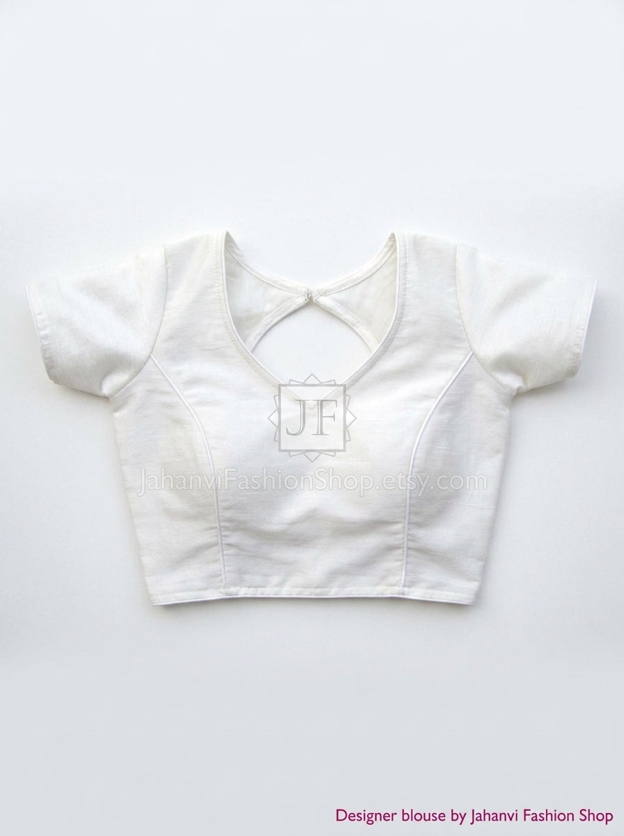 White short-sleeve saree blouse crop top with round back-hole cutout at neckline
