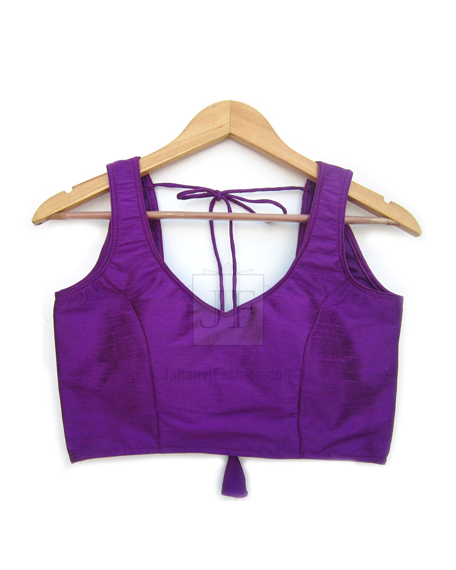 Purple sleeveless saree blouse with sweetheart neckline and tie-up back, stitched bust