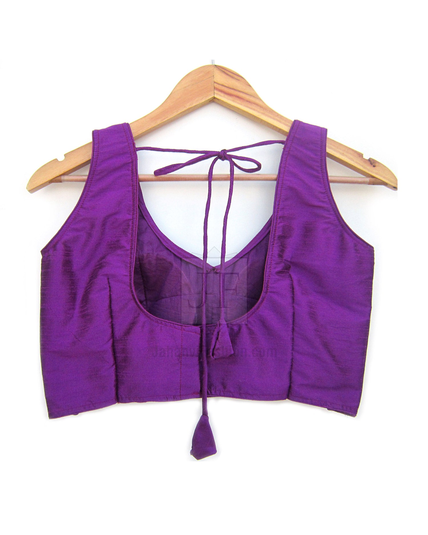 Purple sleeveless saree blouse with open back and long tie straps, sweetheart neckline