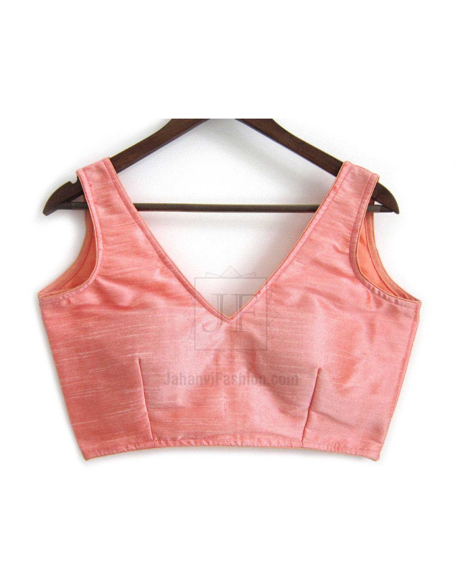 Peach silk V-neck sleeveless blouse, full front view with structured seams