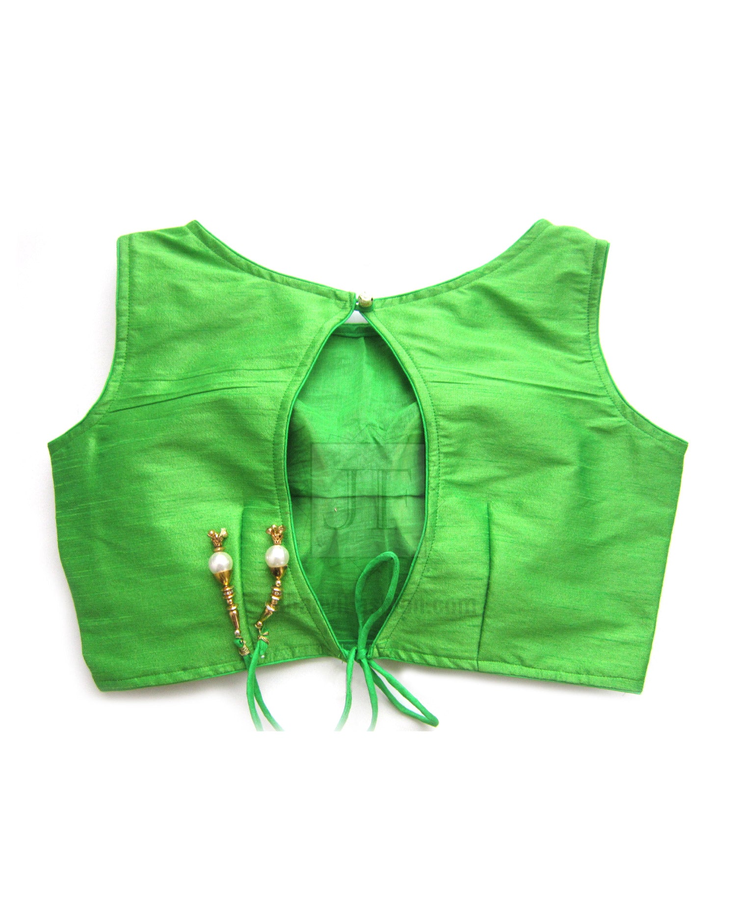 Green sleeveless boat-neck blouse with back tie closure and open back detail
