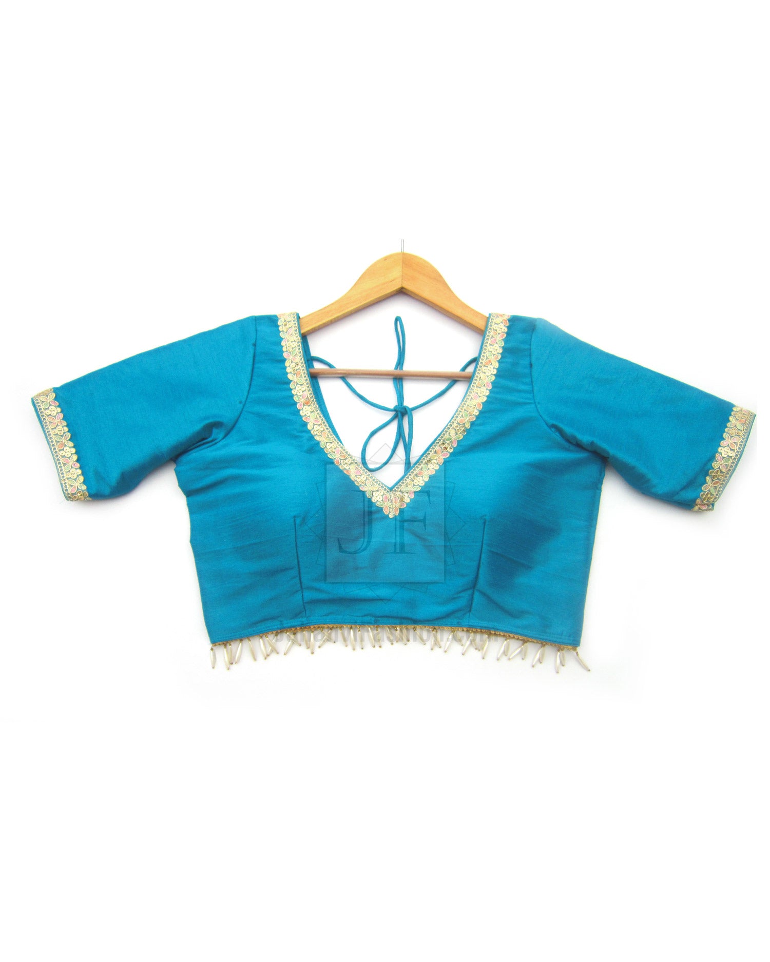 Teal V-neck saree blouse with golden lace trim, tassel fringe, back tie strings