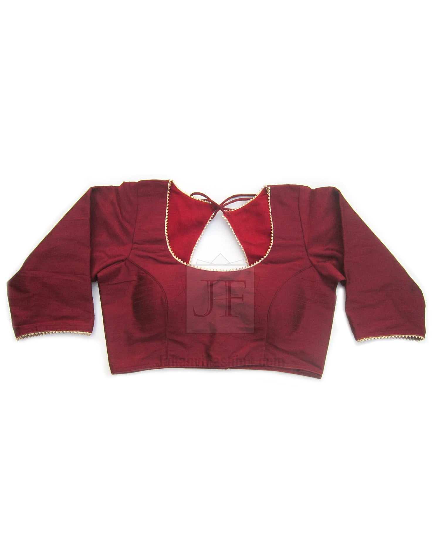 Maroon saree blouse with golden lace trim, boat neckline and three-quarter sleeves
