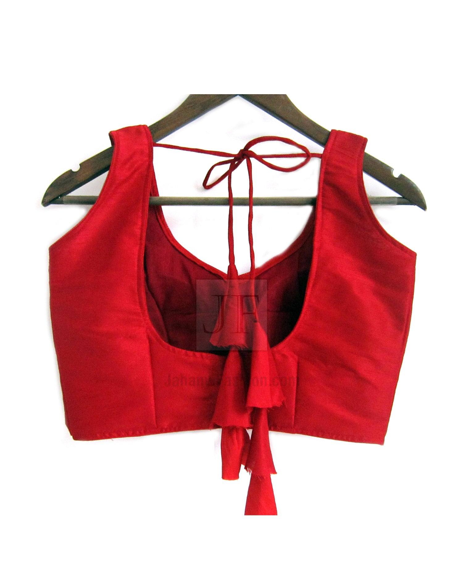 Red sleeveless blouse back with deep U neckline and lace-up tie strings
