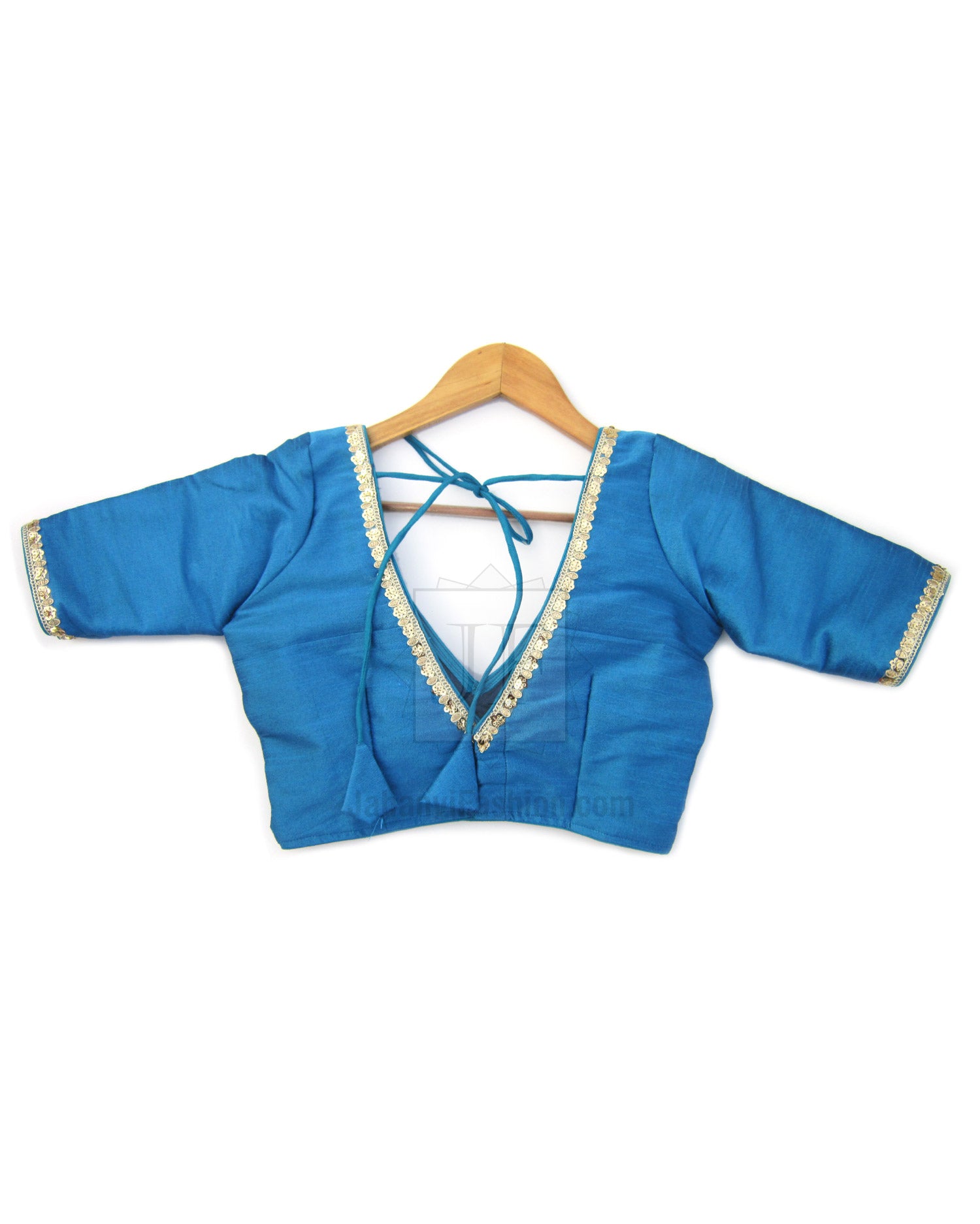 Blue saree blouse back with V-neck and crisscross ties, gold-trim accents