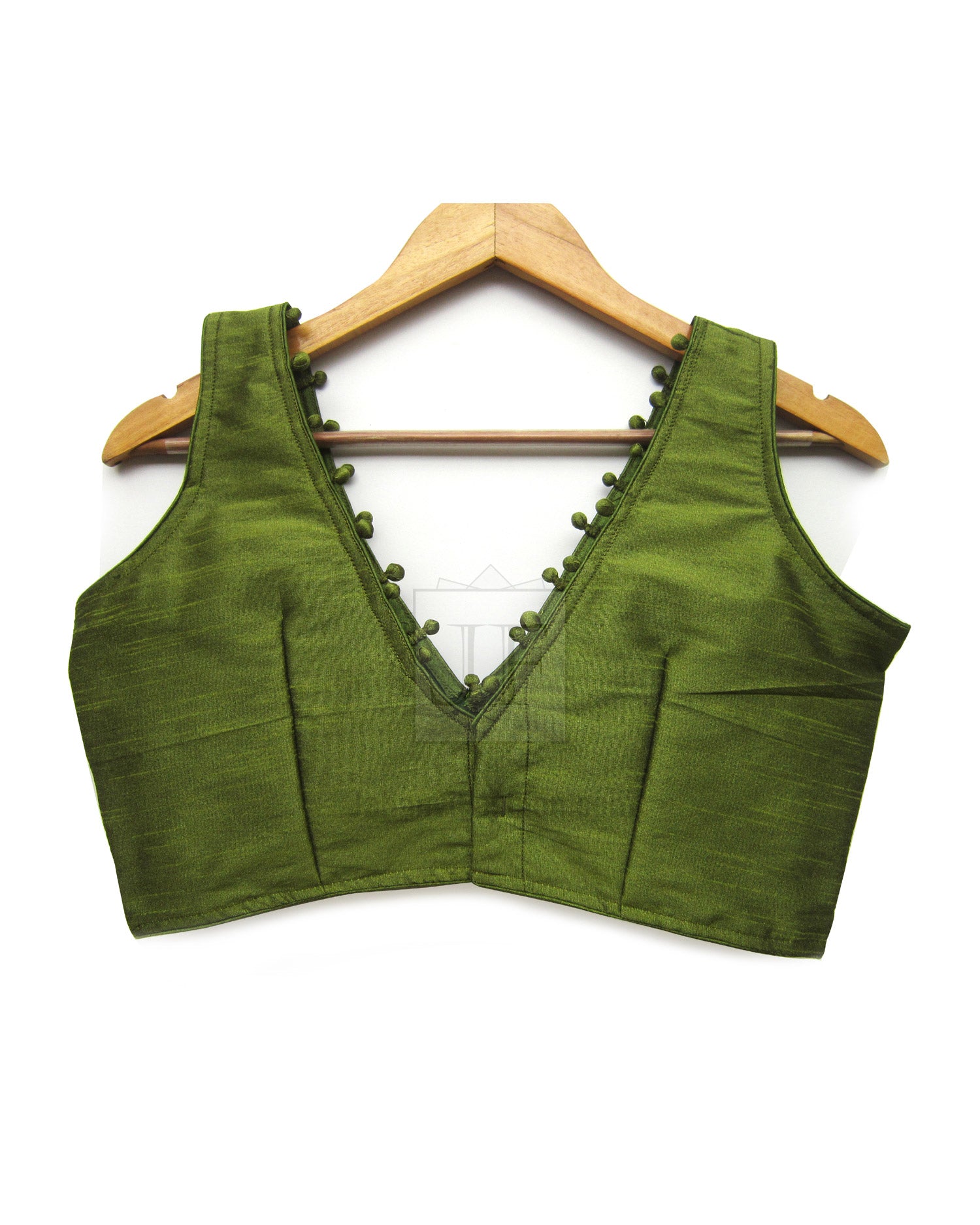 Green V-neck crop saree blouse with beaded trim and sleeveless cut