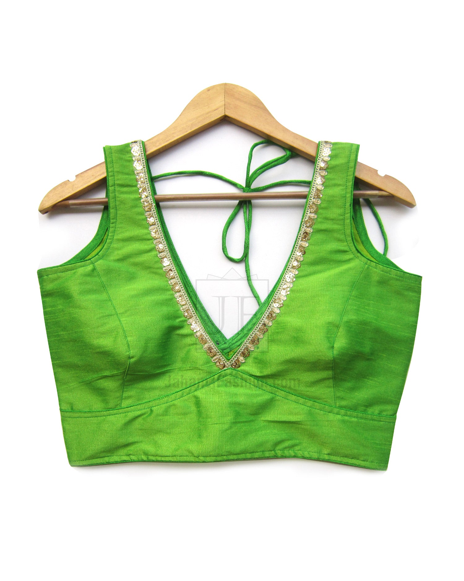 Green saree crop top with V-neck and contrast trim, tie-up back