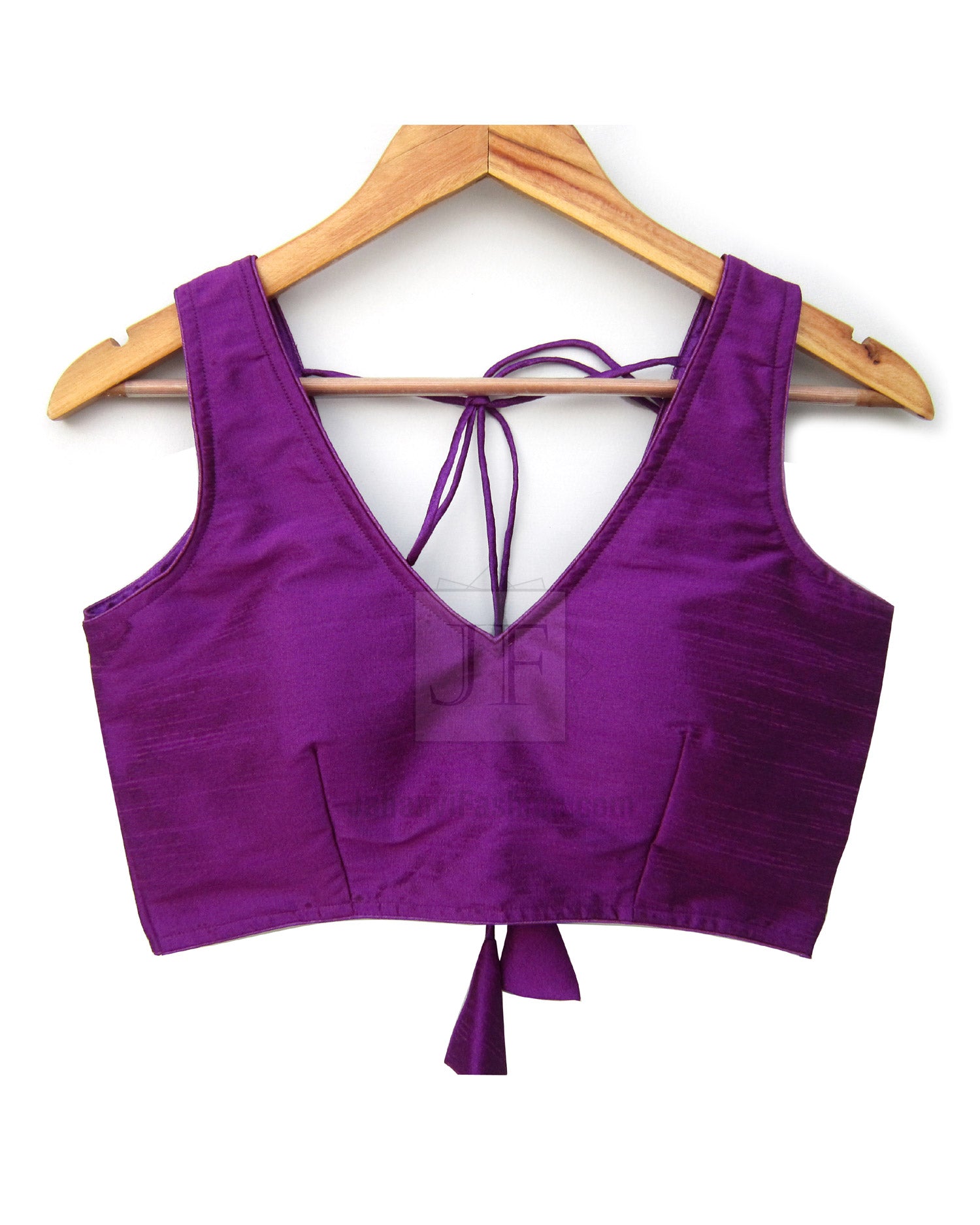Purple sleeveless blouse with deep V-back and adjustable tie strings, cropped style