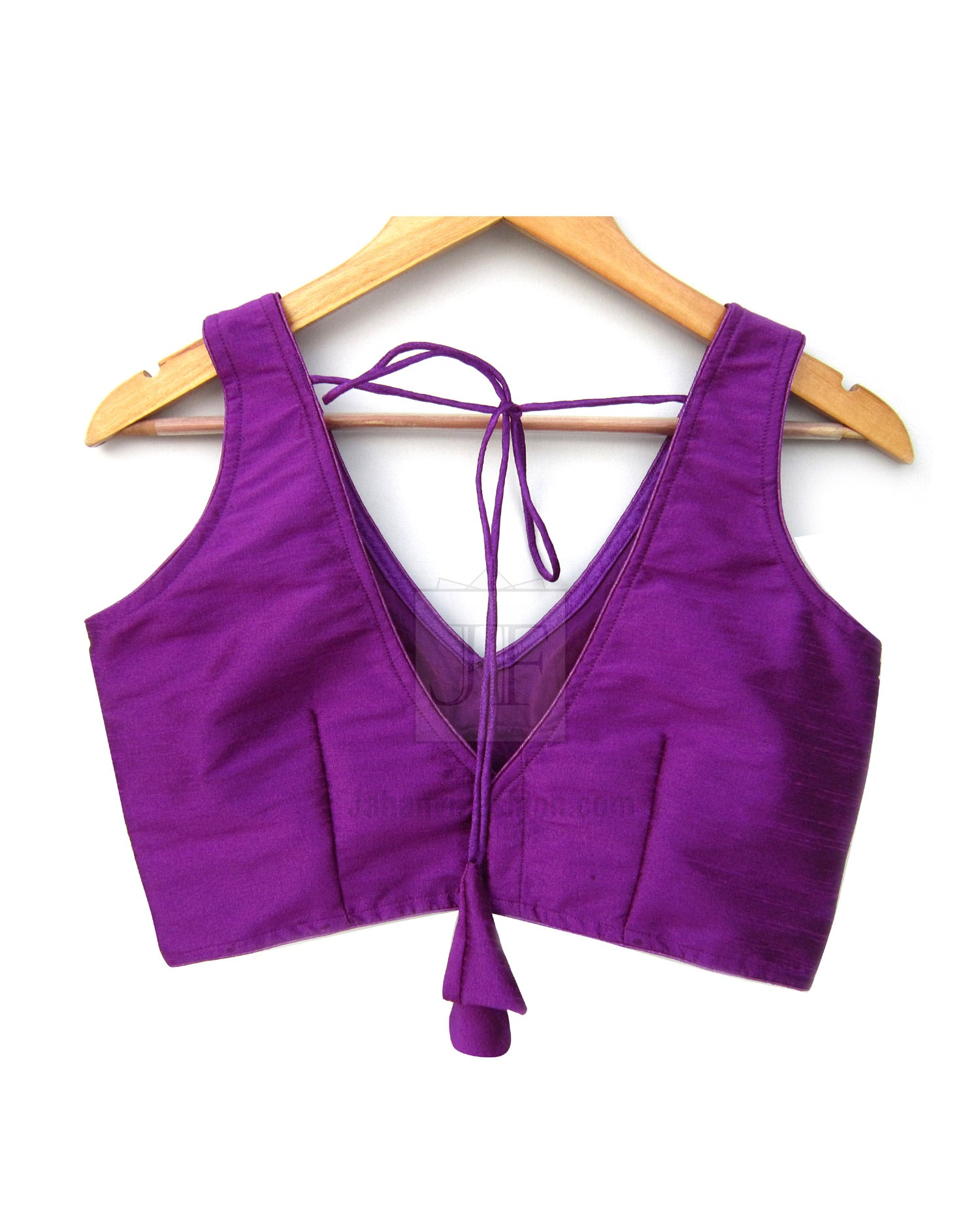 Purple sleeveless blouse with deep V-back and long tie strings, fitted bodice