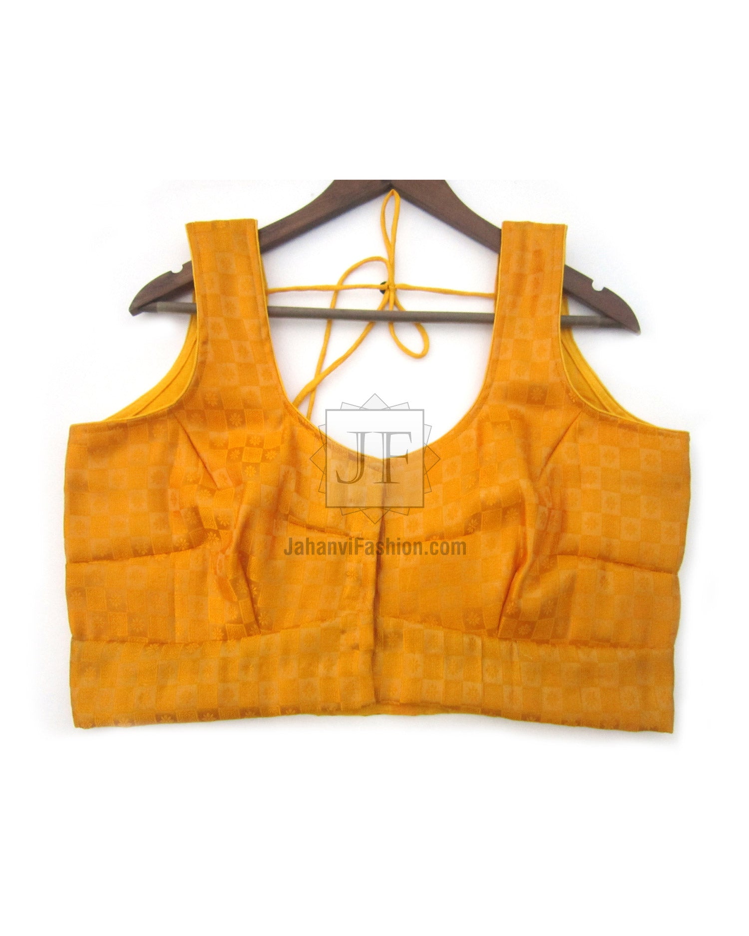 V-neck brocade sleeveless blouse with structured shoulder panels