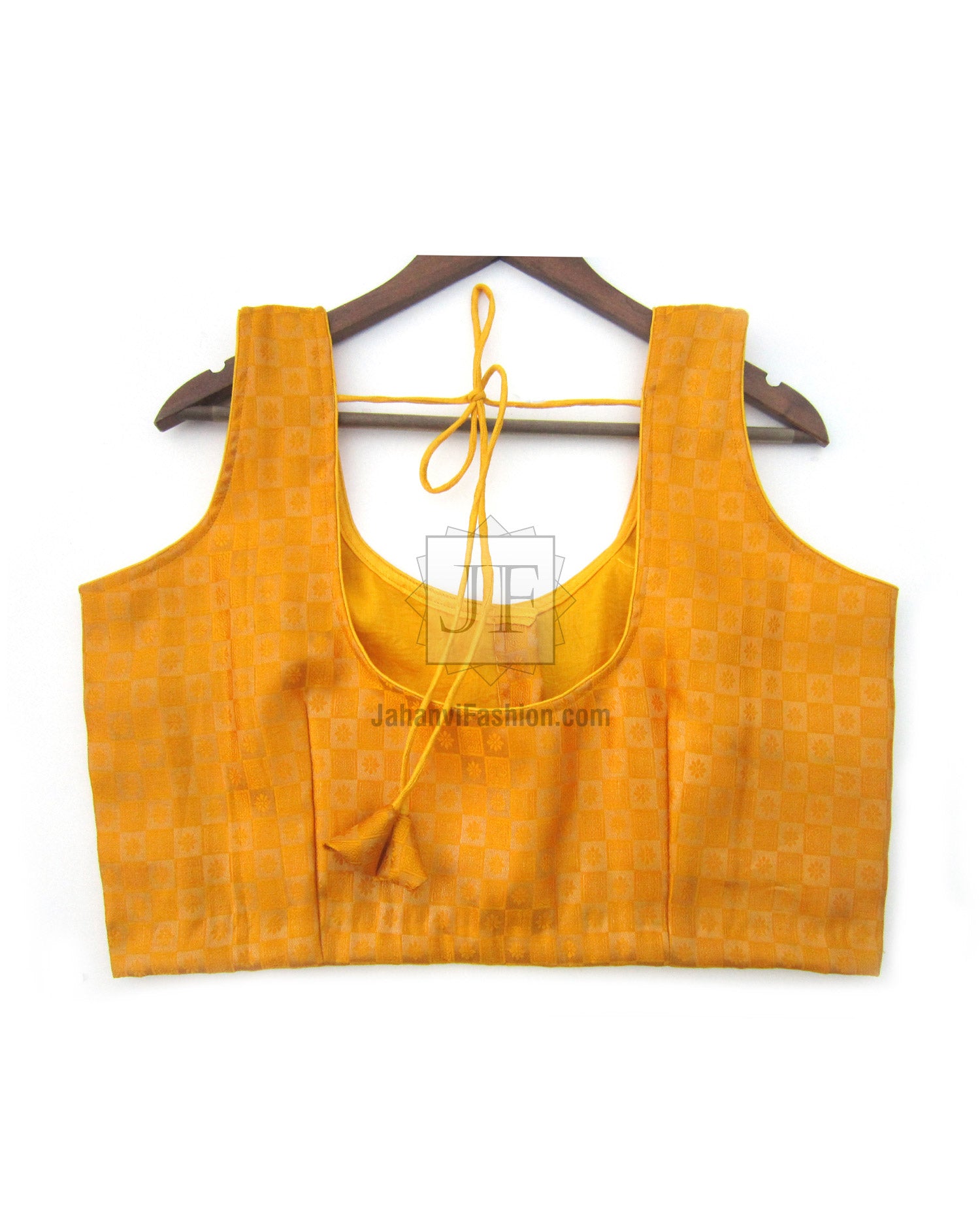 V-neck brocade sleeveless blouse with front tie detail