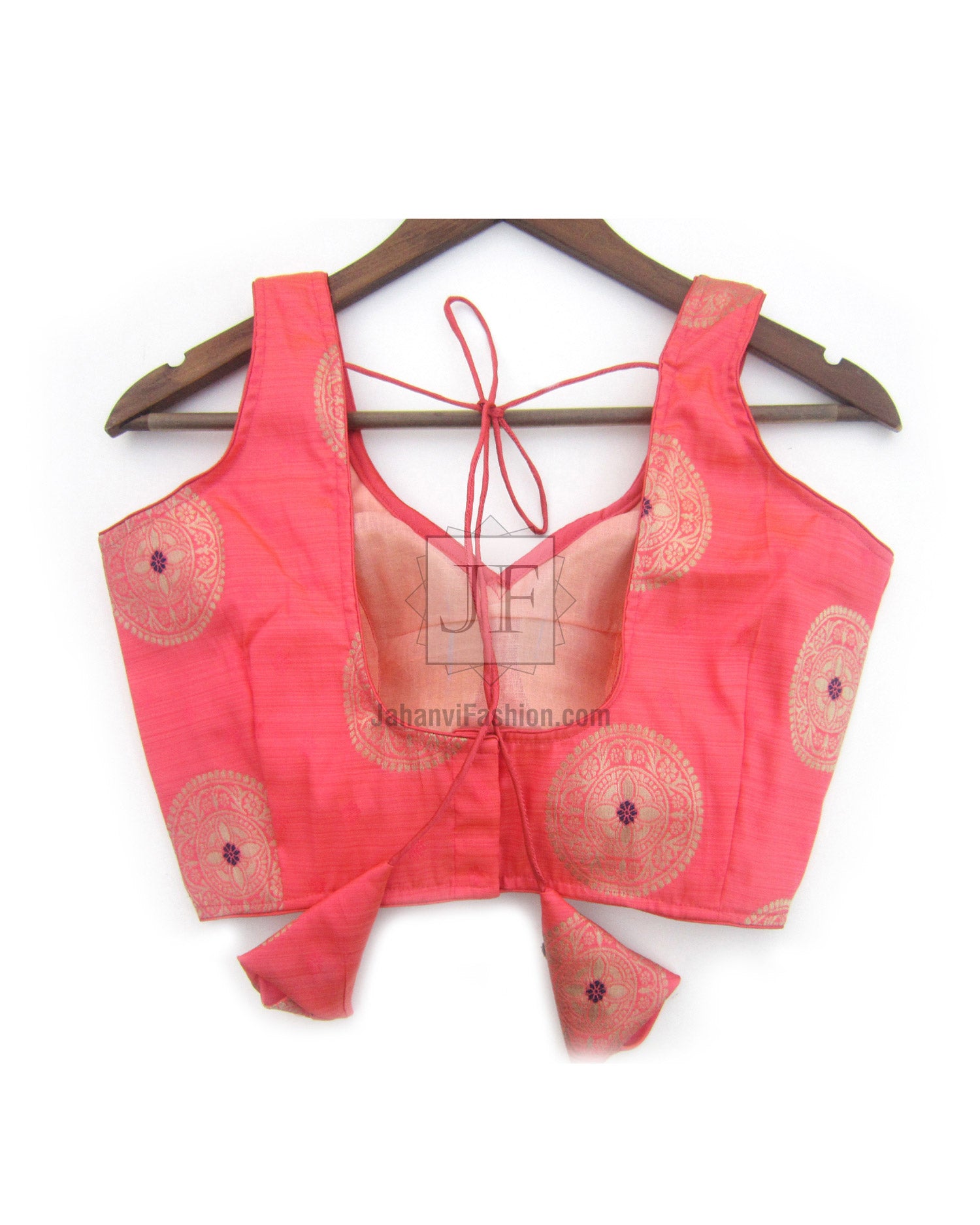 Pink brocade saree blouse, sweetheart neckline, sleeveless, circular motifs, tie-back straps