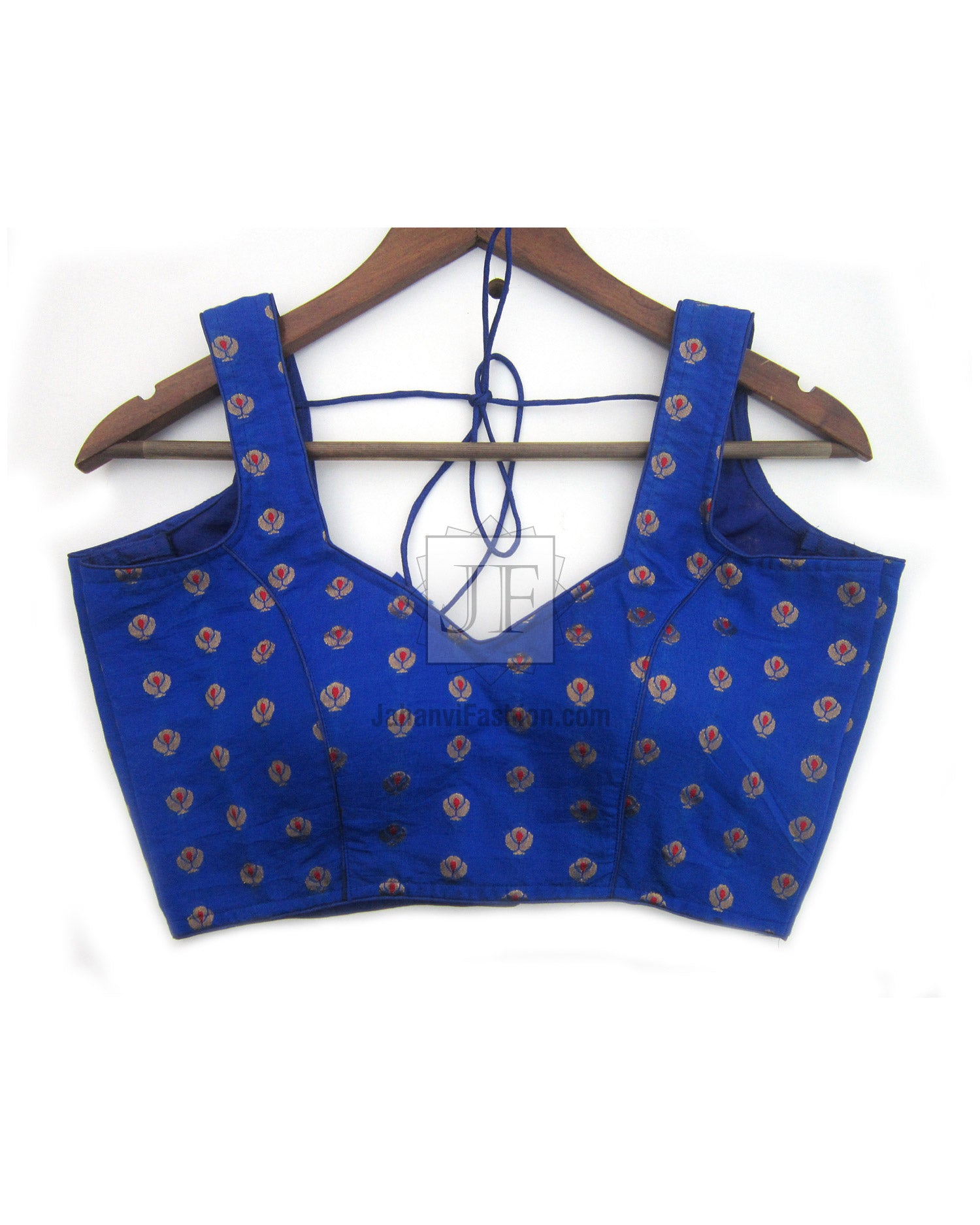 Blue sweetheart-neck saree blouse with small gold embroidery, sleeveless on wooden hanger