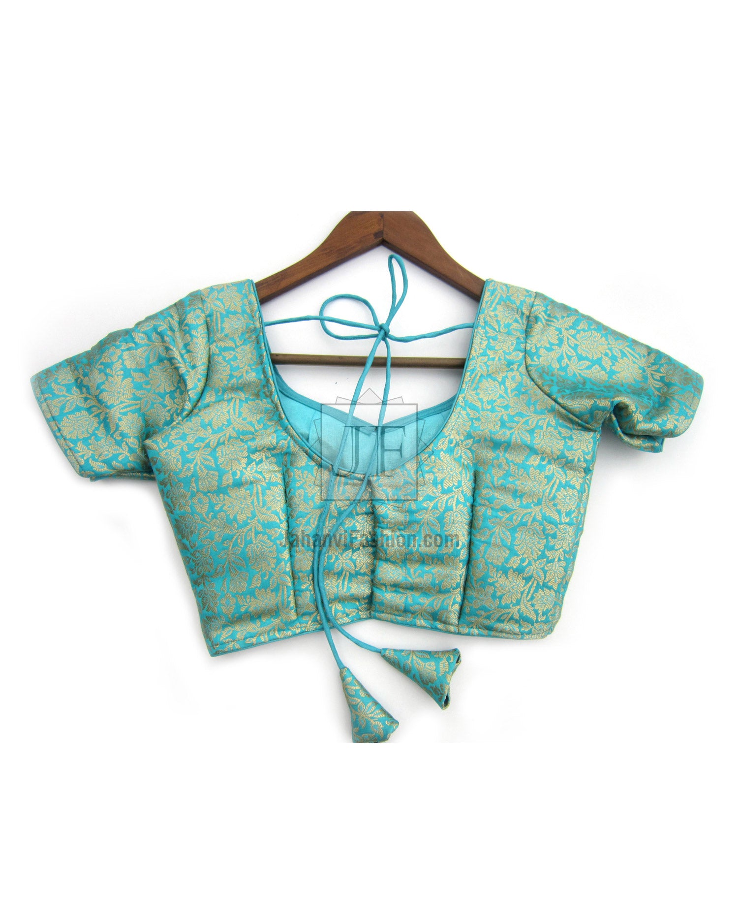 Sea green brocade sari blouse with short sleeves, V-neck, and center tie strings