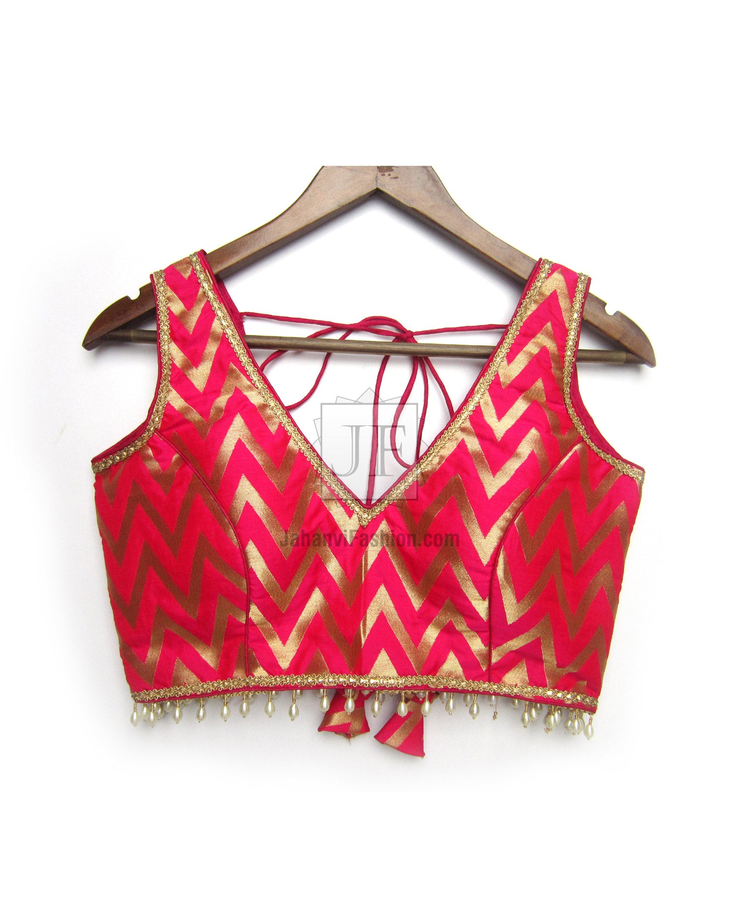 Sleeveless brocade crop blouse with deep V-neck and chevron pattern, magenta/gold, fringe edges