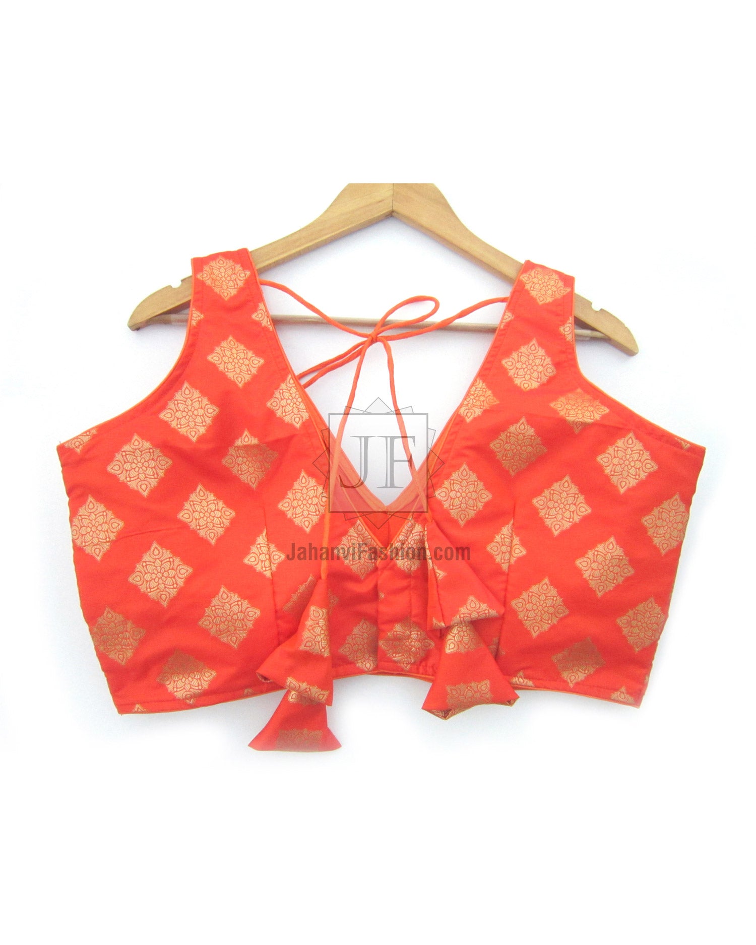 Red brocade V-neck sleeveless crop blouse with gold diamond pattern and tie back strings