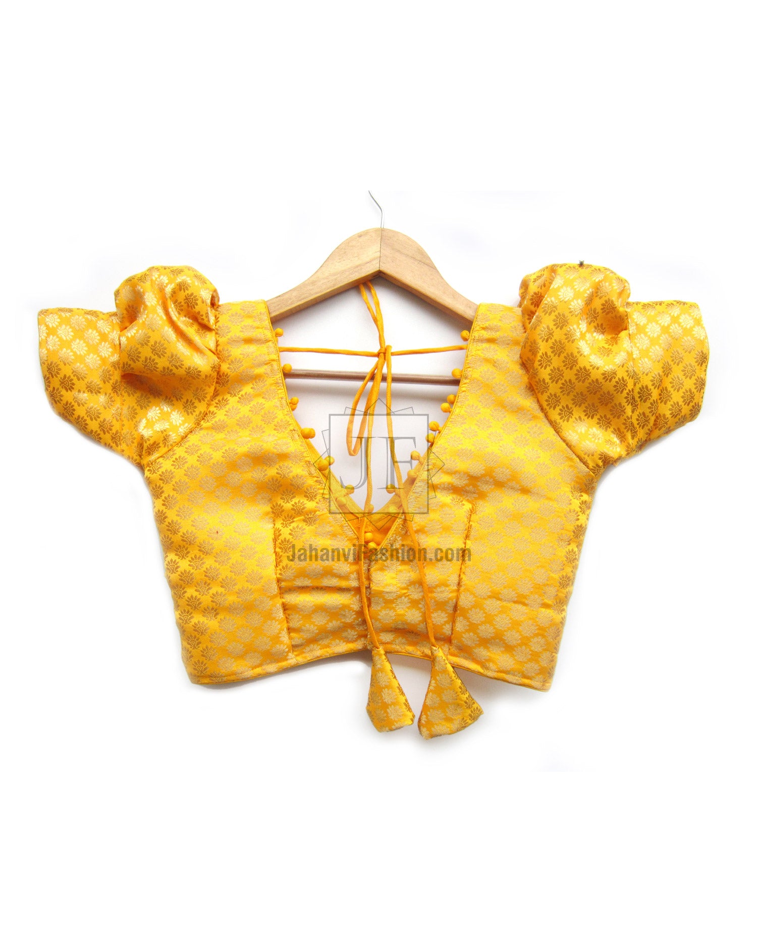 Golden yellow puff-sleeve V-neck saree blouse with ruched shoulders and back tie