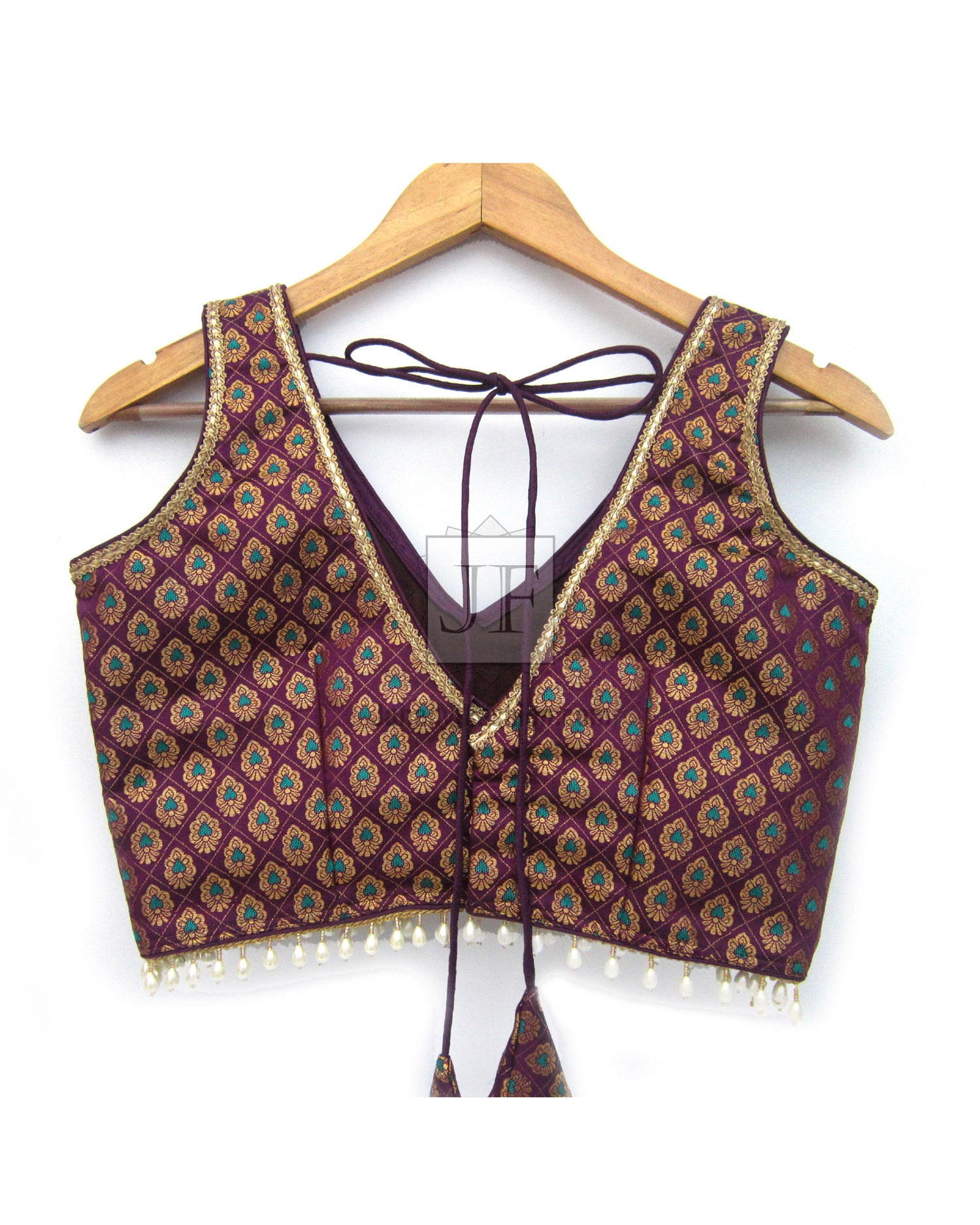 Brocade silk saree blouse, sleeveless V-neck with beaded hem and tie-back strings, maroon