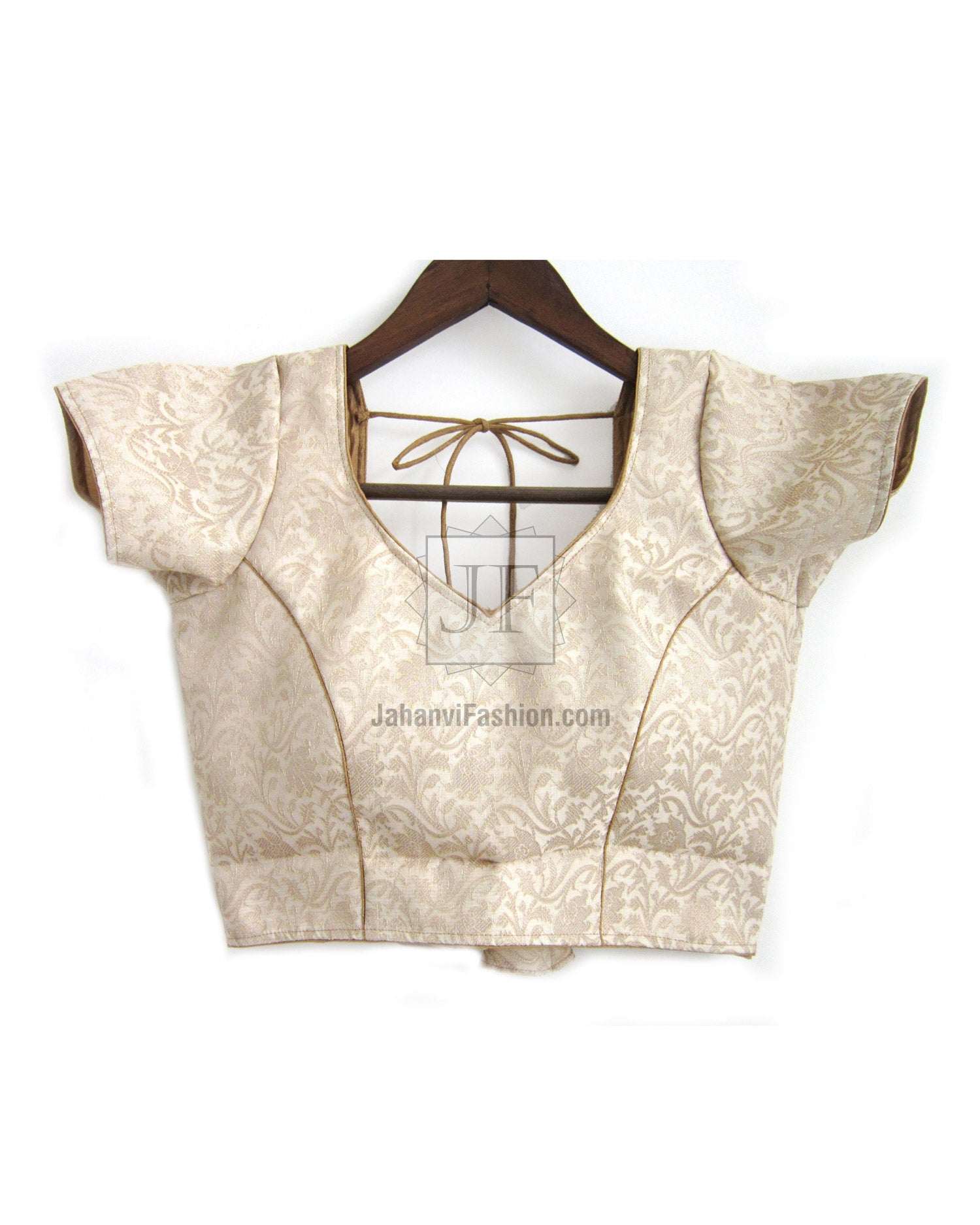 Cream brocade saree blouse with sweetheart neckline and short puff sleeves, front view