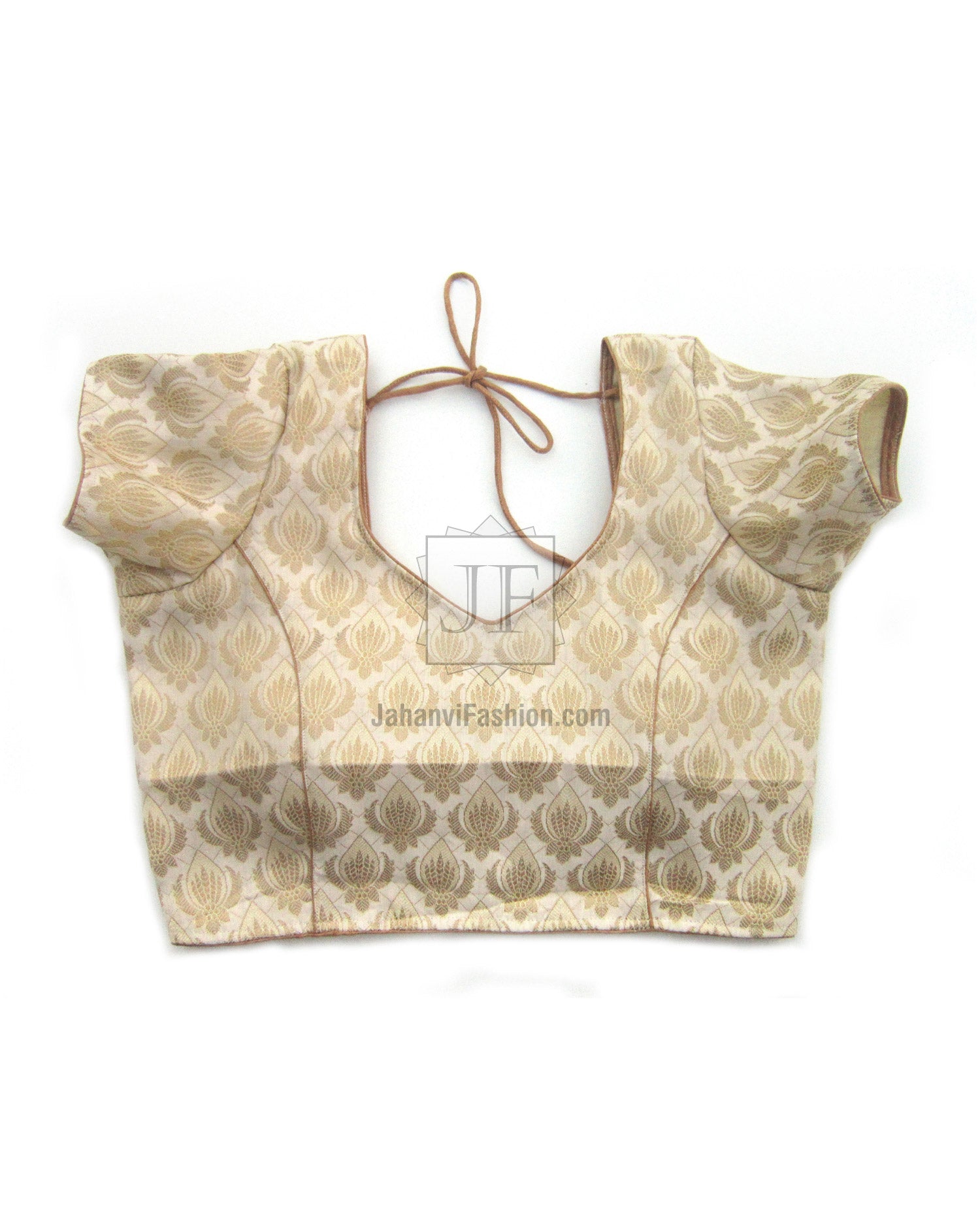 Cream-gold brocade saree blouse with sweetheart neckline, tied-back bow straps, short puff sleeves