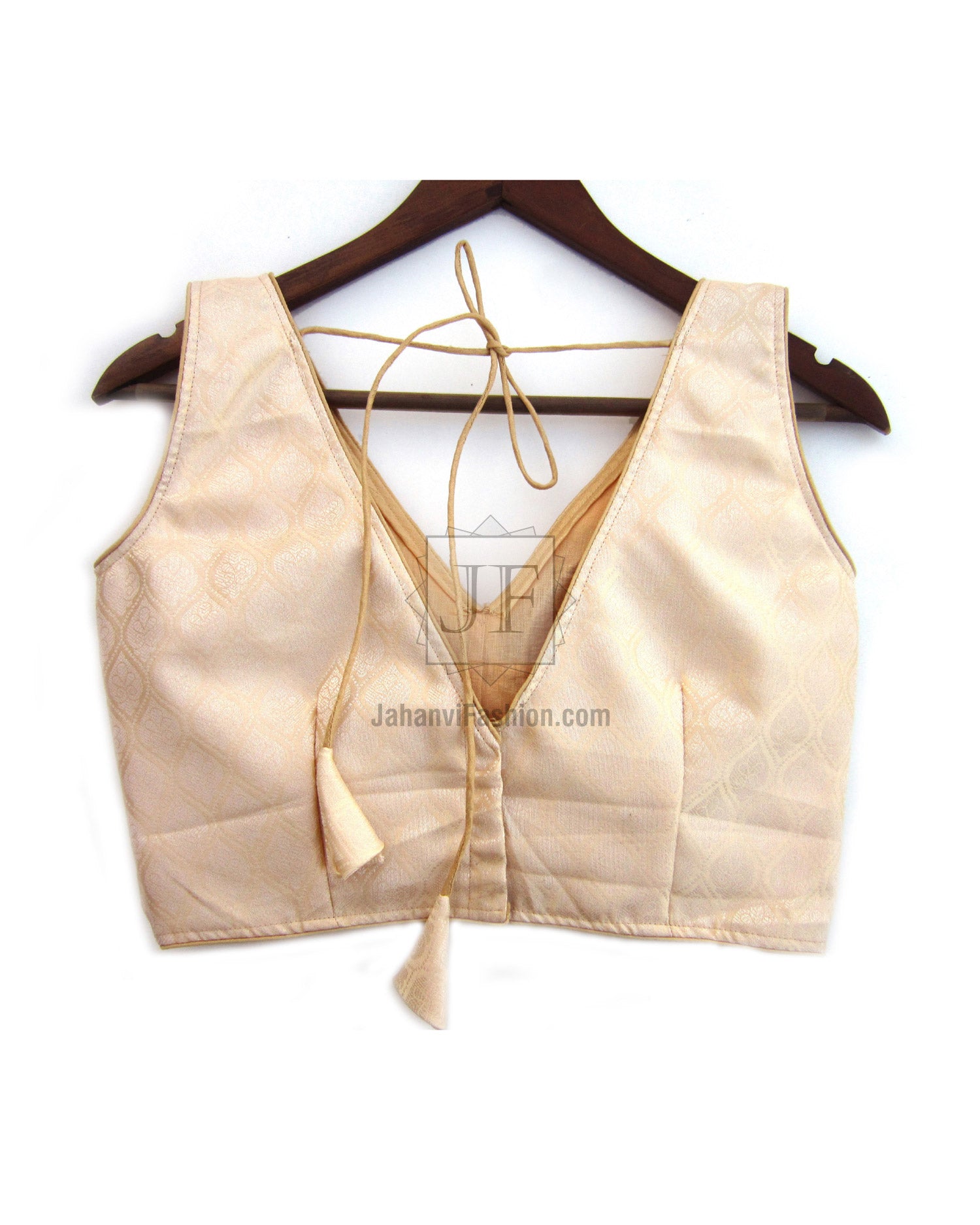 Back-open v-neck saree blouse, light gold, tie closure at open back.