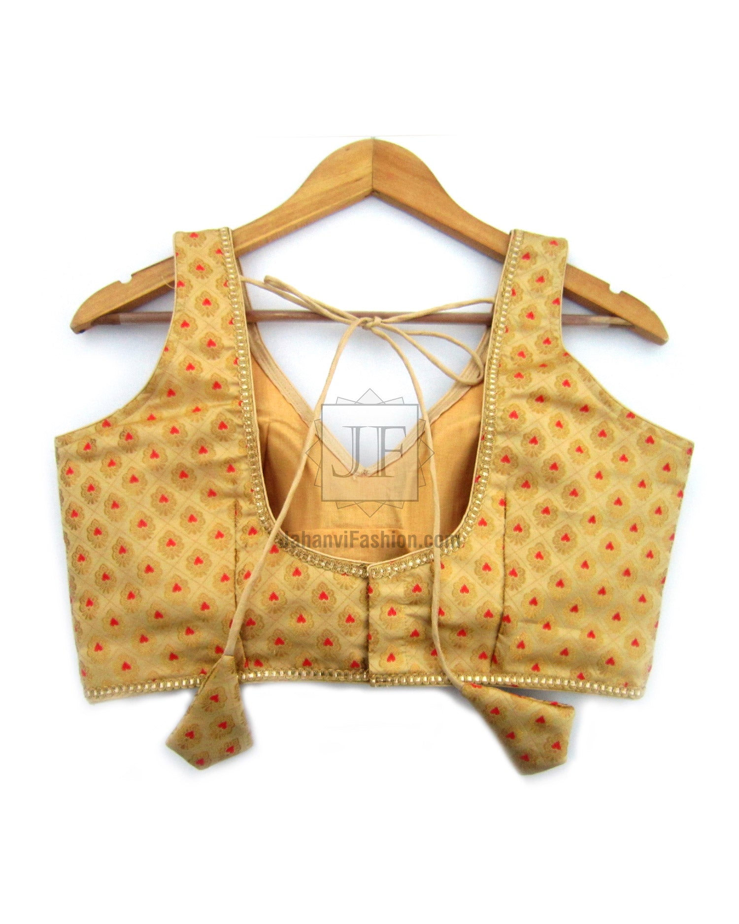 Gold-toned V-neck sleeveless sari blouse with red motif brocade and long back ties