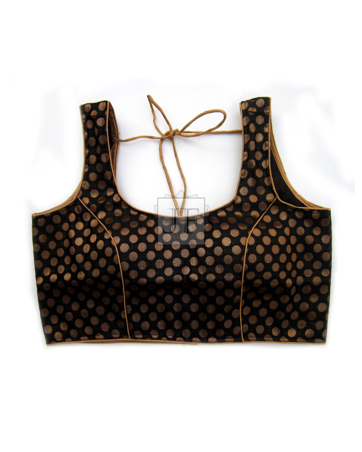 Scoop-neck chanderi blouse with dark base, gold polka-dot pattern, and front lace-up bow