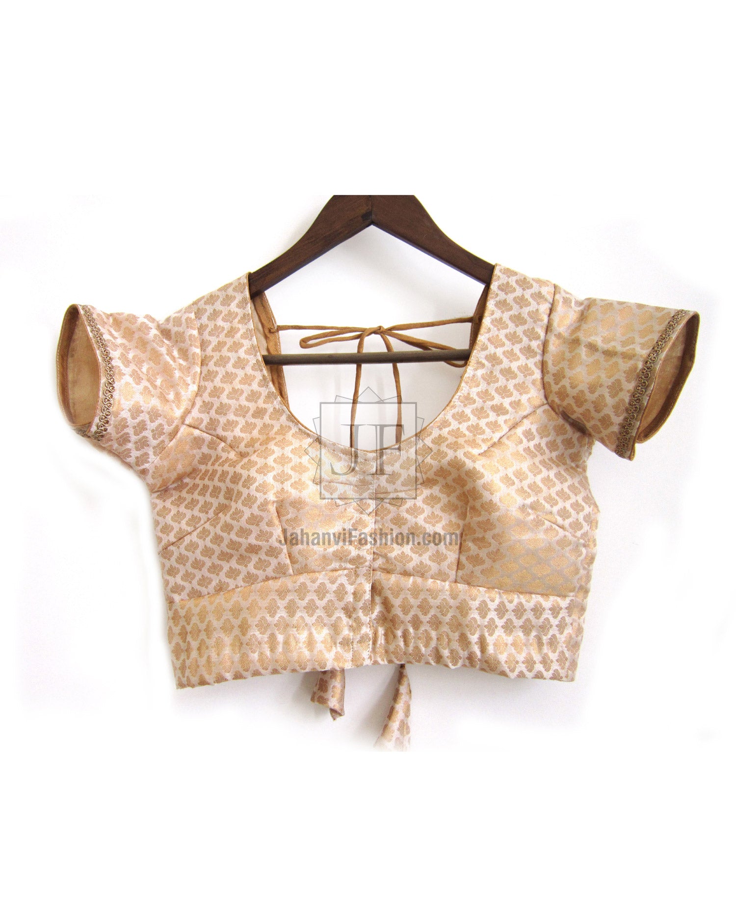 Beige chanderi silk saree blouse with short sleeves, deep V neckline, tassel ties