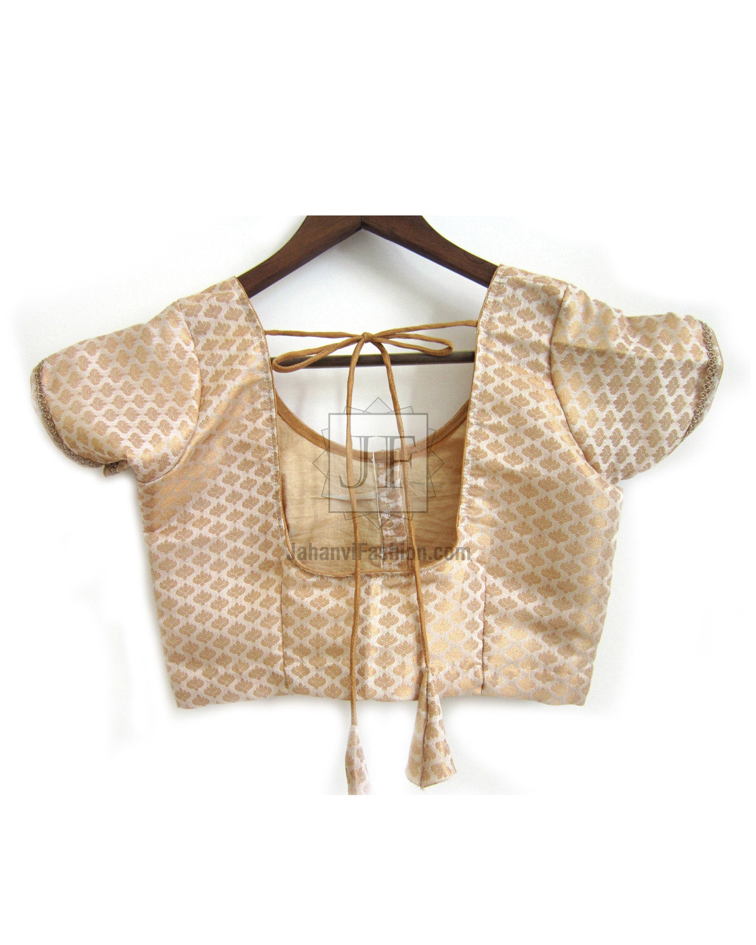 Beige chanderi silk saree blouse with short sleeves, textured pattern, tie-back
