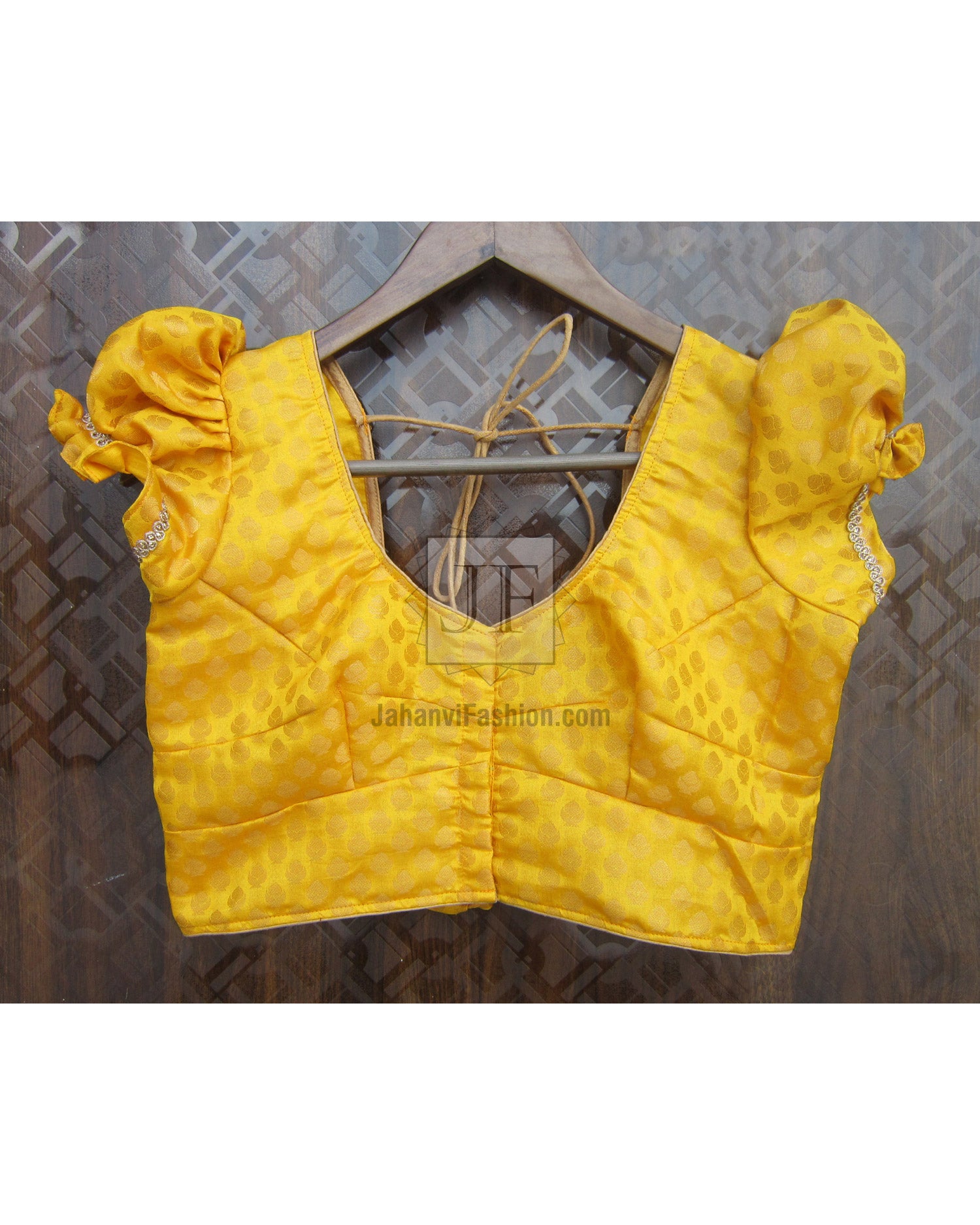 Yellow puff sleeve crop top blouse with textured fabric and wide V neckline