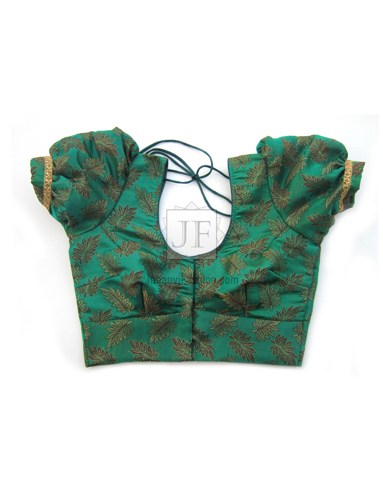 Green saree blouse crop top with puff sleeves and lace-up back, leafy gold patterned fabric.