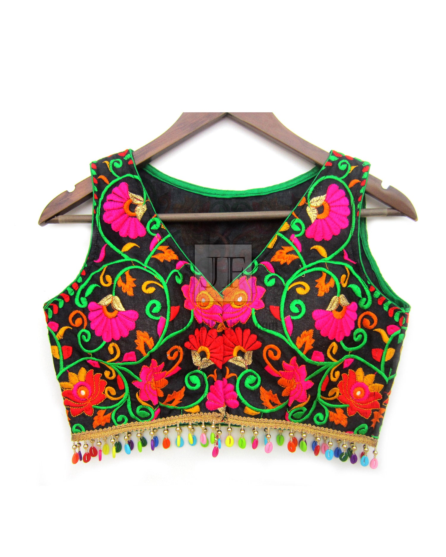 Embroidered crop top blouse with black base, colorful floral pattern, tassel trim, V neckline
