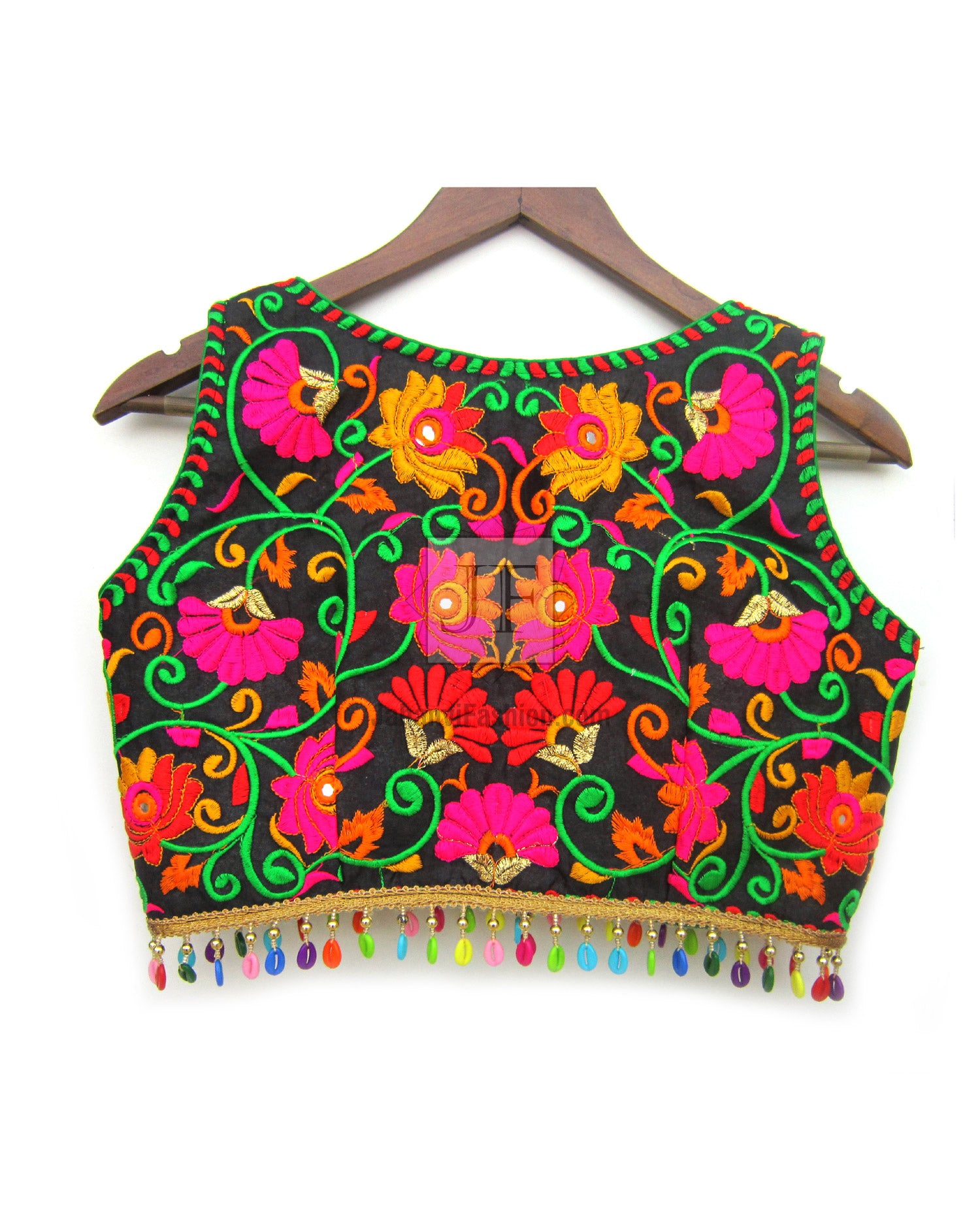 Embroidered crop top blouse with black base, vibrant floral embroidery, green trim, tassel edge