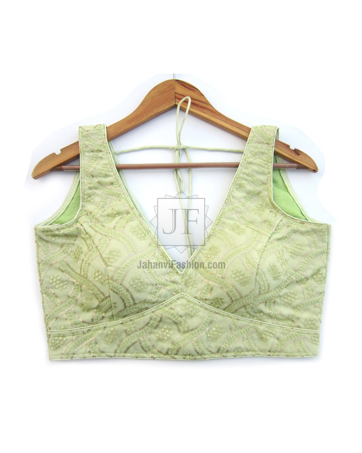Light green embroidered saree blouse, V-neck sleeveless, tie-back strings