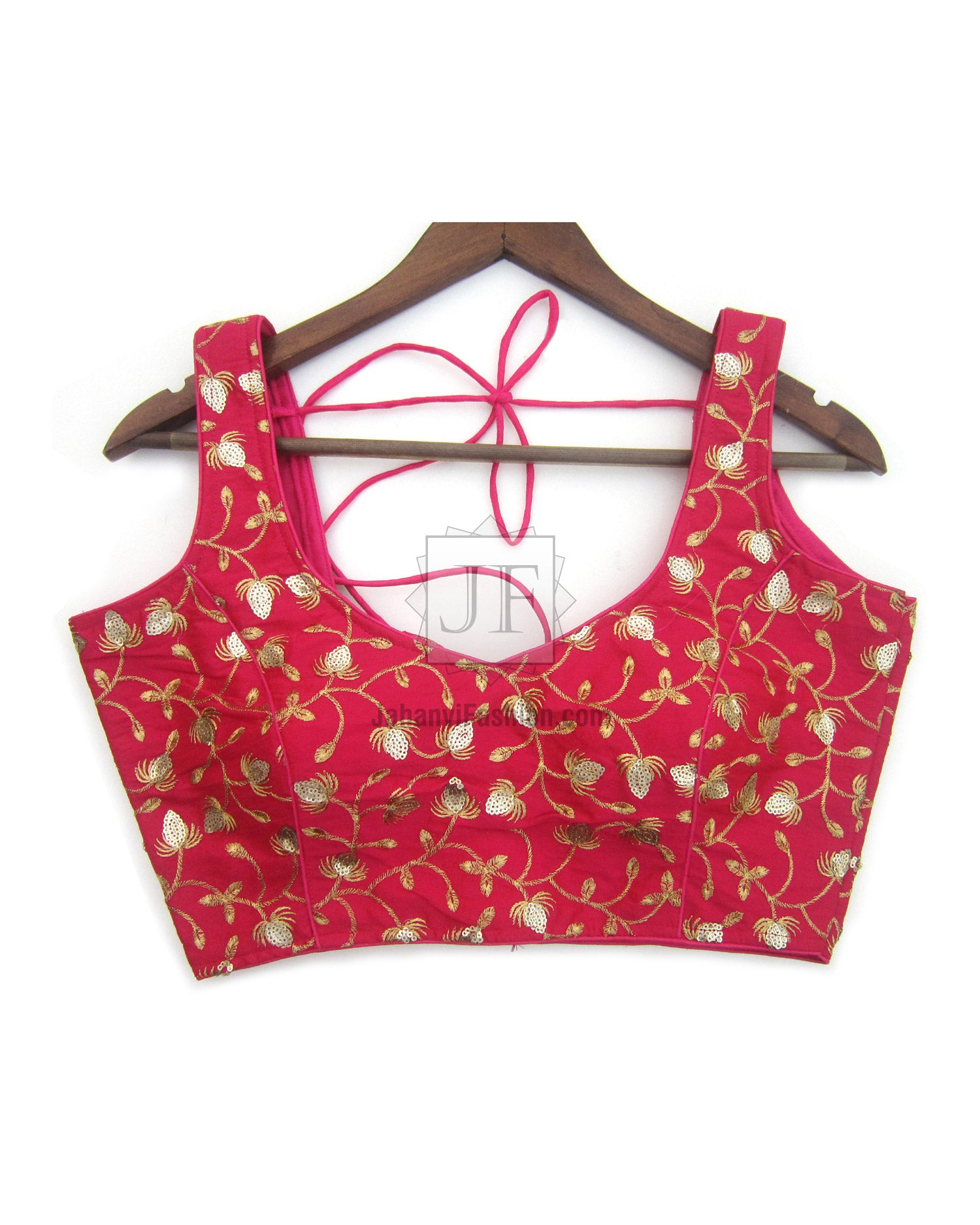 Magenta sleeveless embroidered blouse with gold floral print and tie-back neckline