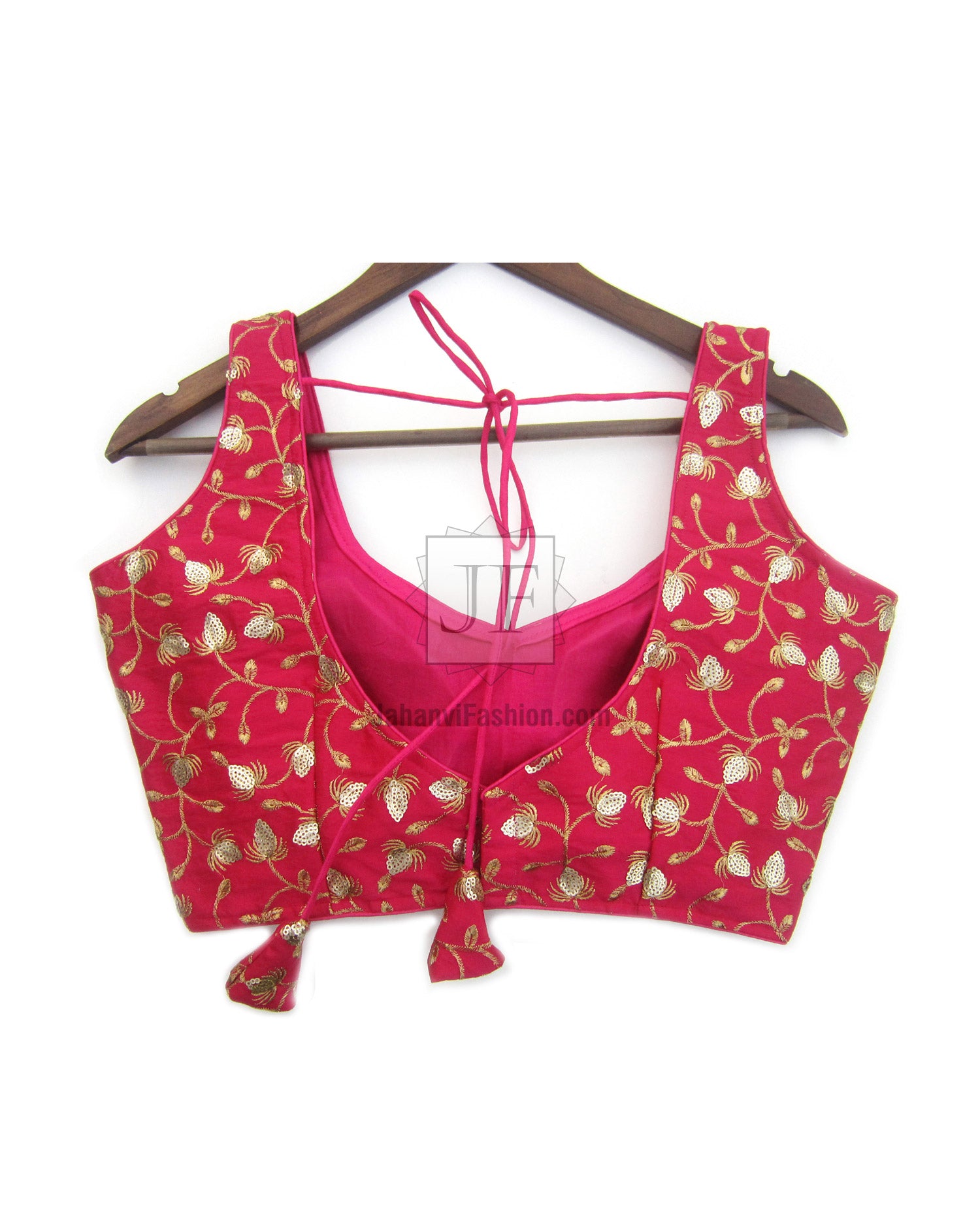 Magenta sleeveless embroidered saree blouse with gold floral pattern and round neckline