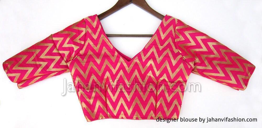 Magenta V-neck brocade saree blouse with chevron zigzag print and three-quarter sleeves