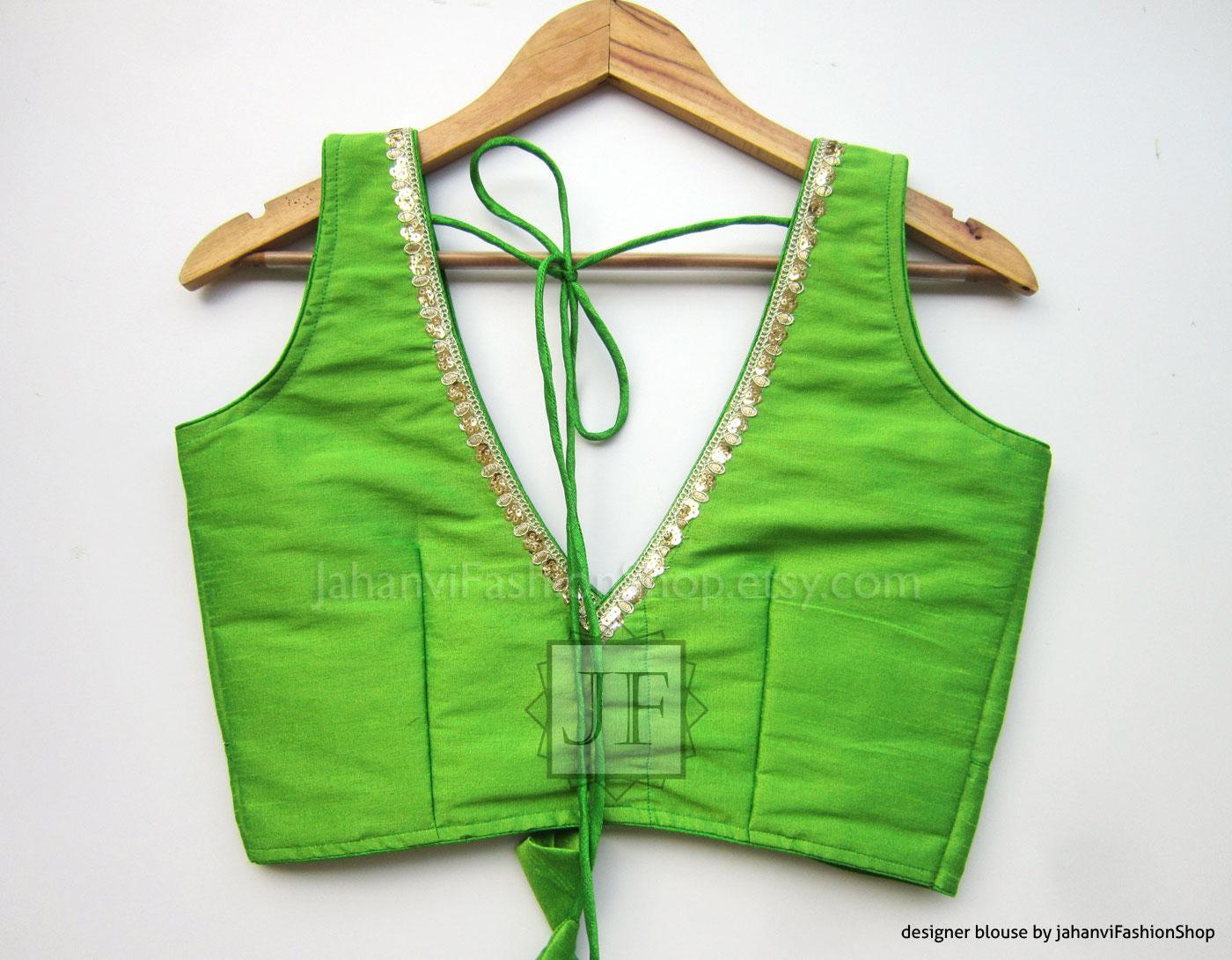 Green saree crop top with contrast crystal trim and tie-back strings, V-neck