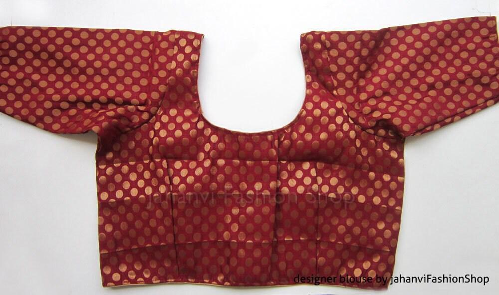 Round-neck saree blouse front, red with gold polka dots, short sleeves