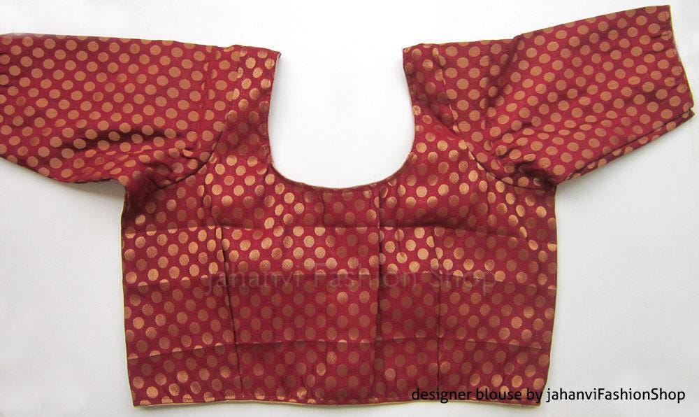 Round-neck saree blouse with short sleeves, red with gold polka dots