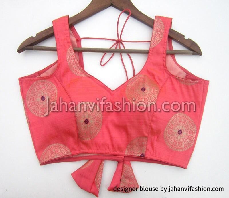 Coral red brocade saree blouse, sweetheart neckline, sleeveless with tie-back straps