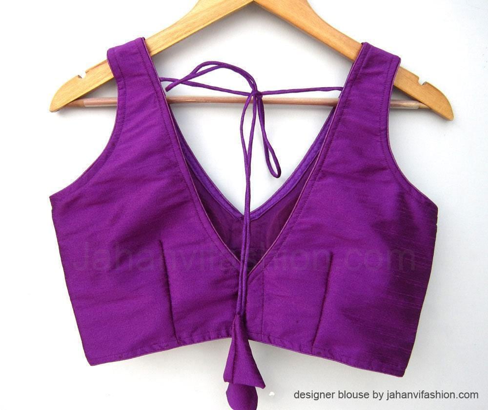 Purple sleeveless saree blouse with deep V-neck, knot tie-back