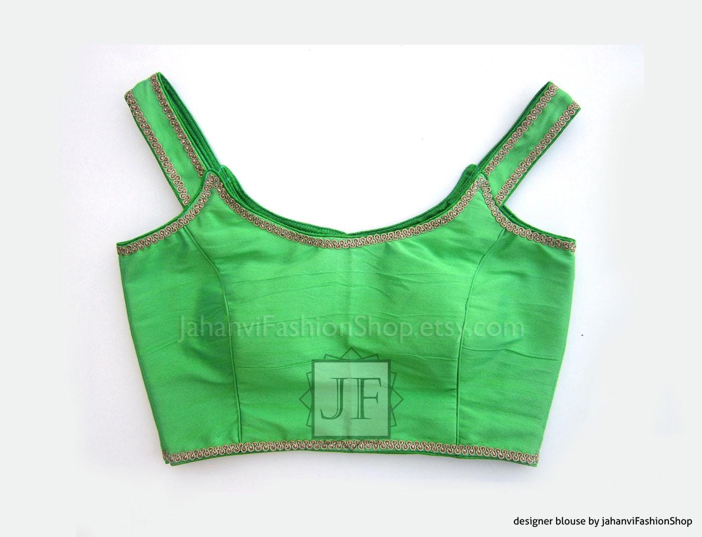 Saree blouse in green off-shoulder style with contrast jeweled trim