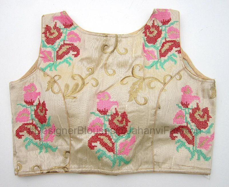 Sleeveless boat-neck embroidered crop blouse, cream/gold fabric with multicolor floral motifs