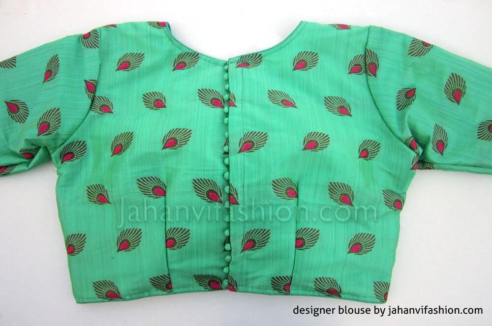 Teal green printed saree blouse with boat neck, long sleeves, vertical button front