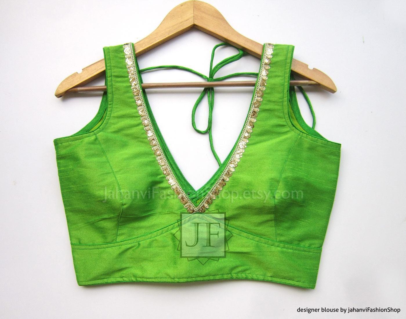 Green saree crop top with V-neck, contrast crystal trim, tie-back halter