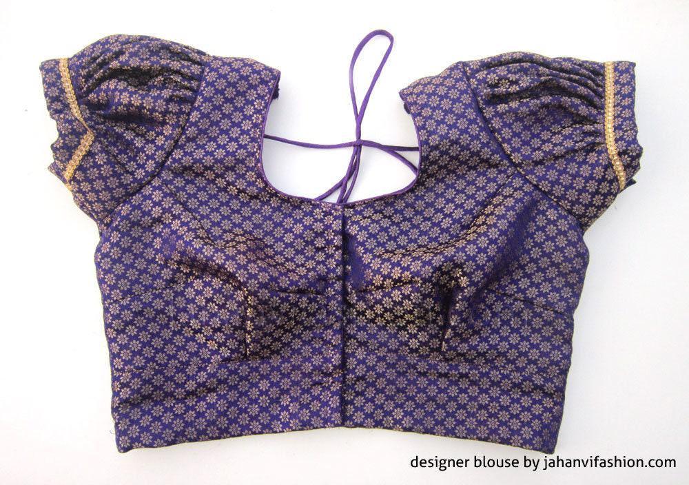 Dark blue brocade puff-sleeve blouse with gold trim, round neckline tie