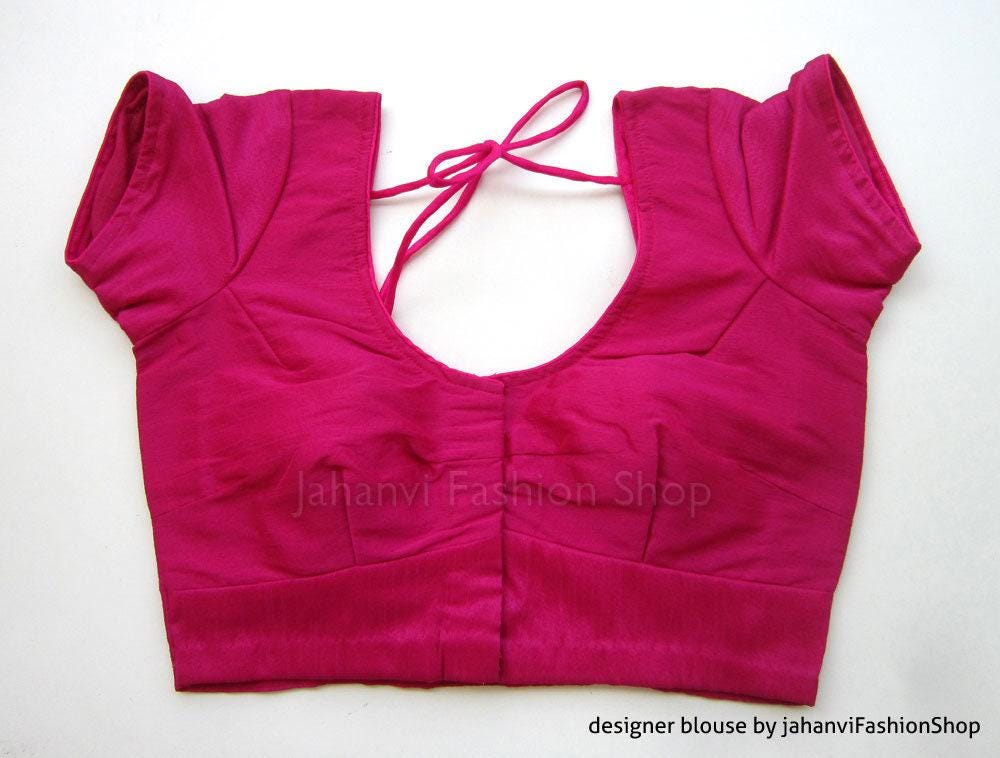 Magenta raw silk blouse with short sleeves and lace-up round neckline