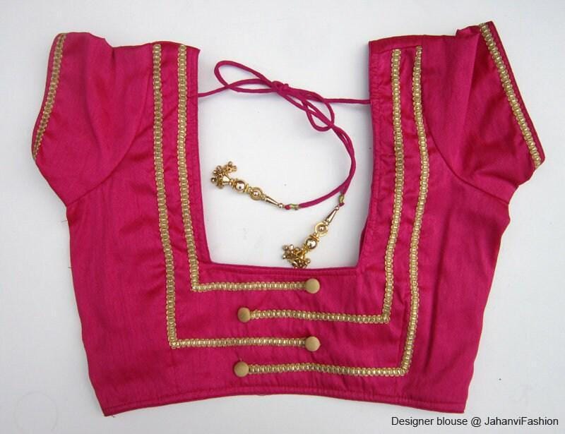 Sleeveless saree blouse, magenta with gold border and eyelet neck ties