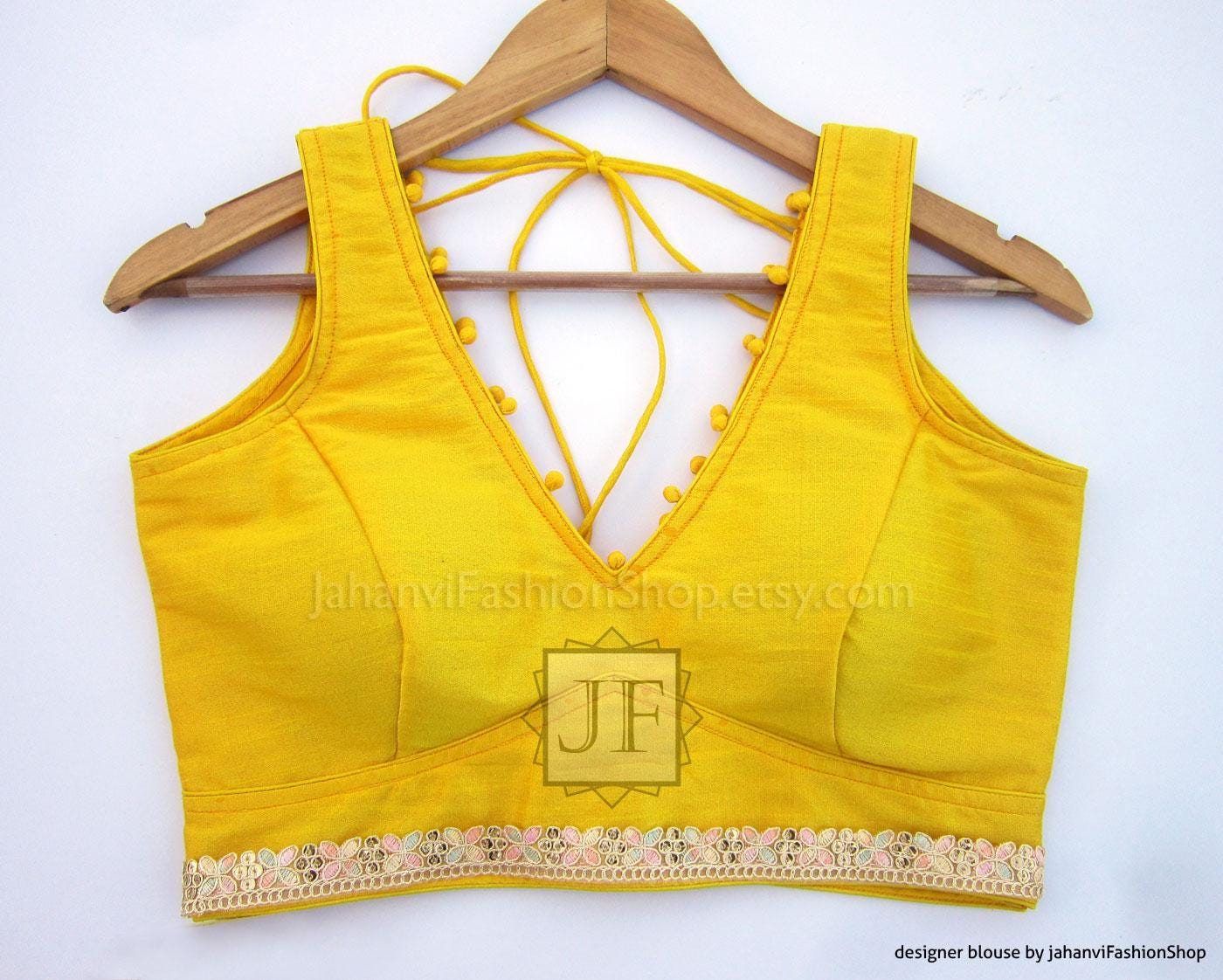 Dupion silk saree blouse, golden-yellow V-neck with multicolor lace trim, tie-back straps